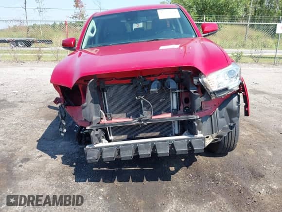 2021 Toyota Tacoma SR5 with VIN 3TYAZ5CN0MT012512, listed as a IAAI auction lot 43257664 with 34,488 mi miles and . Bid and sale history available at DreamBid. Image 6.