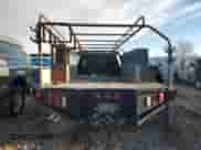 2012 Chevrolet Silverado 3500HD Work Truck z VIN 1GB3KZCG2CF180057, wystawiony jako Copart lot #86861504 z przebiegiem Nie podano mil oraz Czysty tytuł • Clean title. Historia ofert i sprzedaży dostępna na DreamBid. Obrazek 6.