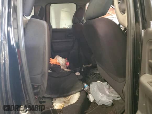 2012 Ram 1500 ST z VIN 1C6RD7FP2CS118348, wystawiony jako Copart lot #68196835 z przebiegiem 192 322 mil mil oraz Czysty tytuł • Clean title. Historia ofert i sprzedaży dostępna na DreamBid. Obrazek 10.