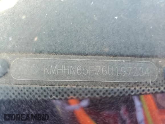 2006 Hyundai Tiburon GT with VIN KMHHN65F76U197234, listed as a Copart auction lot 52775705 with 127,581 mi miles and Clean title. Bid and sale history available at DreamBid. Image 12.