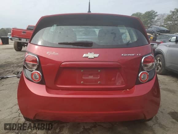 2014 Chevrolet Sonic LT with VIN 1G1JD6SG8E4119106, listed as a Copart auction lot 44583215 with 86,647 mi miles and Salvage title. Bid and sale history available at DreamBid. Image 6.