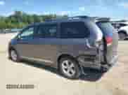 2014 Toyota Sienna LE AAS with VIN 5TDKK3DCXES518761, listed as a Copart auction lot 70665485 with 192,656 mi miles and Salvage title. Bid and sale history available at DreamBid. Image 2.