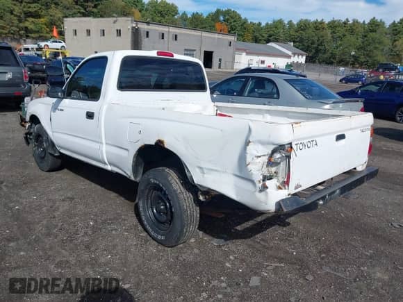 2002 Toyota Tacoma with VIN 5TENL42N42Z104457, listed as a IAAI auction lot 43314724 with 244,750 mi miles and . Bid and sale history available at DreamBid. Image 3.