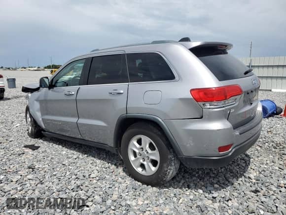 2016 Jeep Grand Cherokee Laredo with VIN 1C4RJEAGXGC344506, listed as a Copart auction lot 70111605 with 140,966 mi miles and Salvage title. Bid and sale history available at DreamBid. Image 2.