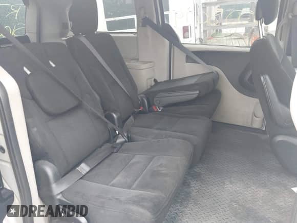 2015 Dodge Grand Caravan American Value z VIN 2C4RDGBG7FR686258, wystawiony jako IAAI lot #42991382 z przebiegiem Nie podano mil oraz . Historia ofert i sprzedaży dostępna na DreamBid. Obrazek 8.