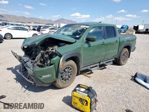 2023 Nissan Frontier Pro-4X with VIN 1N6ED1EK0PN670488, listed as a Copart auction lot 64129775 with 15,294 mi miles and Salvage title. Bid and sale history available at DreamBid. Image 1.