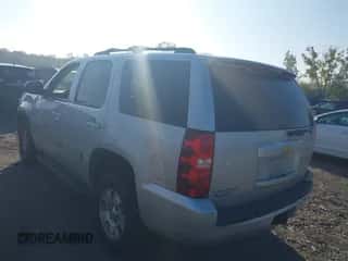 2013 Chevrolet Tahoe LS with VIN 1GNSKAE02DR285441, listed as a IAAI auction lot 43303869 with 230,513 mi miles and . Bid and sale history available at DreamBid. Image 3.