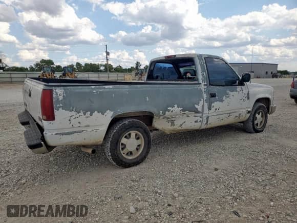 1994 GMC Sierra 1500 z VIN 1GTDC14Z1RZ501012, wystawiony jako Copart lot #68832095 z przebiegiem 94 450 mil mil oraz Szkoda całkowita • Salvage title. Historia ofert i sprzedaży dostępna na DreamBid. Obrazek 3.