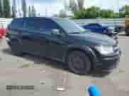 2015 Dodge Journey American Value with VIN 3C4PDCAB2FT644972, listed as a Copart auction lot 64377425 with 131,776 mi miles and Salvage title. Bid and sale history available at DreamBid. Image 4.