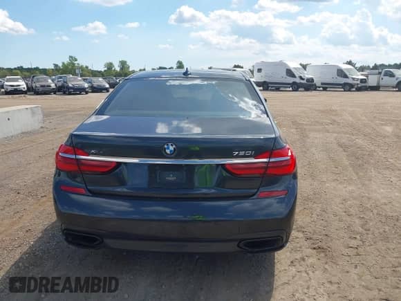 2016 BMW 7 Series 750i xDrive with VIN WBA7F2C51GG416492, listed as a IAAI auction lot 43127235 with 115,379 mi miles and . Bid and sale history available at DreamBid. Image 16.