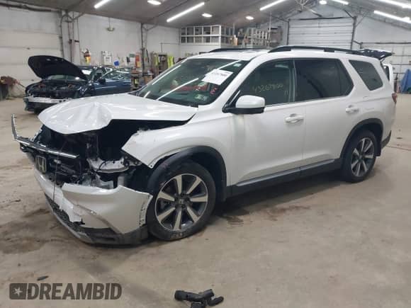 2025 Honda Pilot Elite с VIN 5FNYG1H89SB050057, выставлен на аукционе IAAI как лот 43267800 с пробегом 20 247 миль миль и . История ставок и продаж доступна на DreamBid. Изображение 19.