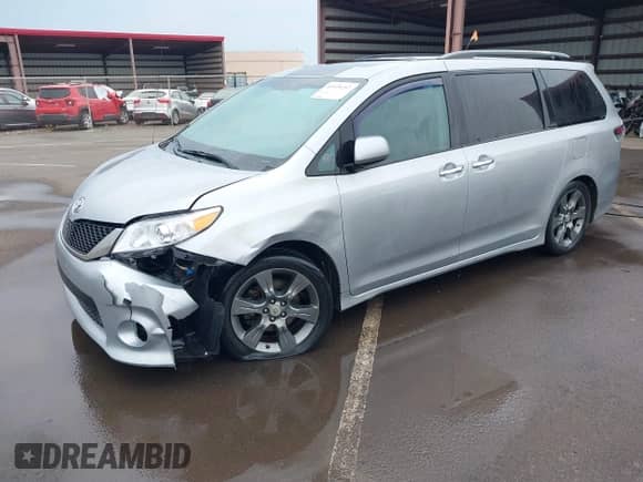 2013 Toyota Sienna SE with VIN 5TDXK3DC4DS366898, listed as a IAAI auction lot 41939257 with 157,292 mi miles and . Bid and sale history available at DreamBid. Image 2.