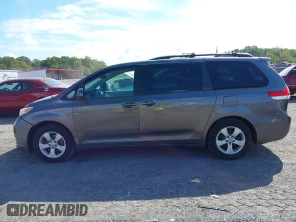 2011 Toyota Sienna LE AAS with VIN 5TDKK3DC8BS055000, listed as a IAAI auction lot 43107518 with 167,768 mi miles and . Bid and sale history available at DreamBid. Image 14.