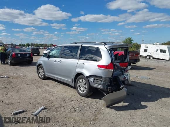 2013 Toyota Sienna XLE AAS with VIN 5TDYK3DC2DS387396, listed as a IAAI auction lot 43428145 with 106,661 mi miles and . Bid and sale history available at DreamBid. Image 3.