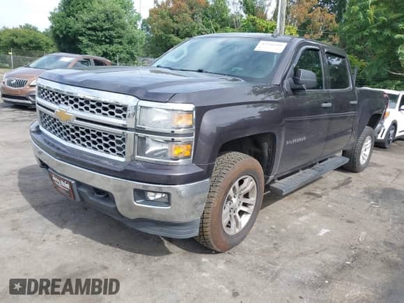 2014 Chevrolet Silverado 1500 LT with VIN 1GCUKREC5EF193544, listed as a IAAI auction lot 42326599 with 158,051 mi miles and . Bid and sale history available at DreamBid. Image 2.