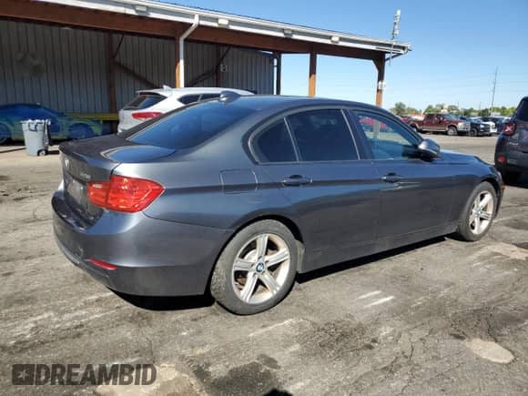 2013 BMW 3 Series 328i xDrive with VIN WBA3B3C57DF540588, listed as a Copart auction lot 85345655 with 111,033 mi miles and Clean title. Bid and sale history available at DreamBid. Image 3.