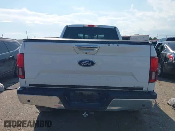 2018 Ford F-150 XL z VIN 1FTFW1EG0JKC58870, wystawiony jako IAAI lot #43209369 z przebiegiem 122 374 mil mil oraz . Historia ofert i sprzedaży dostępna na DreamBid. Obrazek 16.