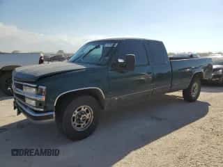 1996 Chevrolet Silverado 2500 с VIN 1GCGC29R9TE185336, выставлен на аукционе Copart как лот 71776394 с пробегом 279 034 миль миль и Списание • Salvage title. История ставок и продаж доступна на DreamBid. Изображение 1.