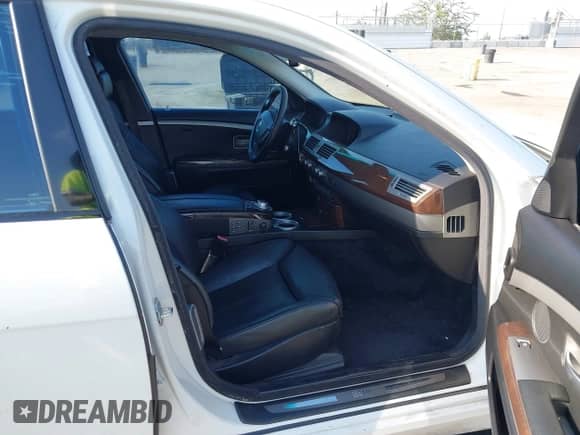 2007 BMW 7 Series 750Li с VIN WBAHN835X7DT70754, выставлен на аукционе IAAI как лот 42923451 с пробегом 229 573 миль миль и . История ставок и продаж доступна на DreamBid. Изображение 5.