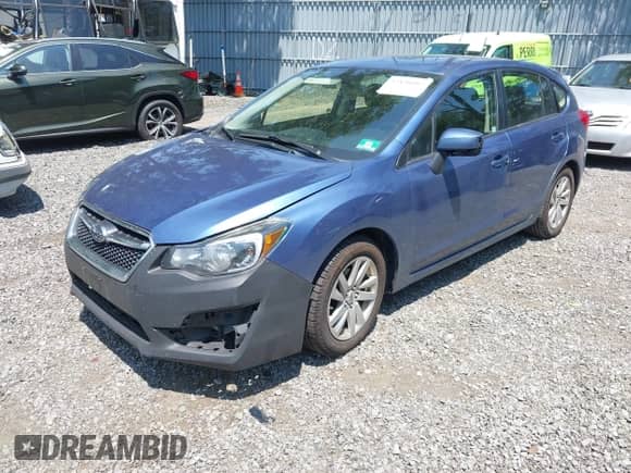 2016 Subaru Impreza Premium with VIN JF1GPAB62G8261357, listed as a IAAI auction lot 42830407 with 98,352 mi miles and . Bid and sale history available at DreamBid. Image 2.