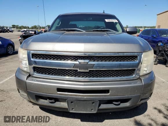 2009 Chevrolet Silverado 1500 LTZ с VIN 1GCEK39019Z228053, выставлен на аукционе Copart как лот 69630765 с пробегом 119 852 миль миль и Списание • Salvage title. История ставок и продаж доступна на DreamBid. Изображение 5.