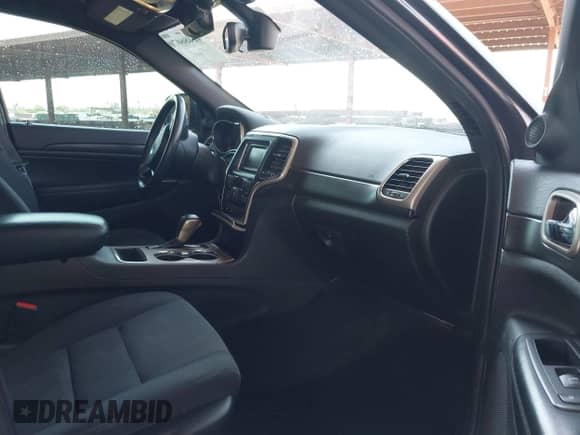 2017 Jeep Grand Cherokee Laredo z VIN 1C4RJFAG7HC661893, wystawiony jako IAAI lot #42486070 z przebiegiem 181 620 mil mil oraz . Historia ofert i sprzedaży dostępna na DreamBid. Obrazek 5.