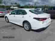2021 Toyota Camry LE with VIN 4T1C11AK8MU601313, listed as a IAAI auction lot 43383218 with 34,384 mi miles and . Bid and sale history available at DreamBid. Image 3.