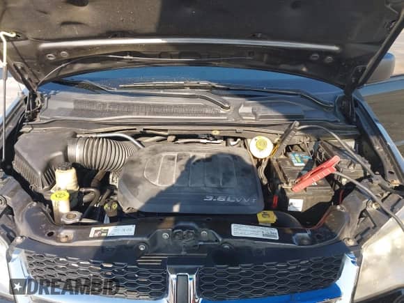 2014 Dodge Grand Caravan American Value with VIN 2C4RDGBG9ER162902, listed as a IAAI auction lot 43043596 with 89,719 mi miles and . Bid and sale history available at DreamBid. Image 10.