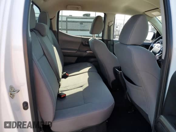 2018 Toyota Tacoma SR5 z VIN 3TMBZ5DN7JM014784, wystawiony jako Copart lot #55620295 z przebiegiem 69 331 mil mil oraz Szkoda całkowita • Salvage title. Historia ofert i sprzedaży dostępna na DreamBid. Obrazek 10.