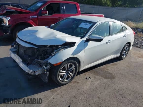 2016 Honda Civic LX z VIN 19XFC2F59GE242934, wystawiony jako IAAI lot #43139806 z przebiegiem 95 282 mil mil oraz . Historia ofert i sprzedaży dostępna na DreamBid. Obrazek 18.