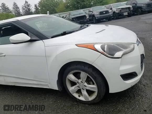 2013 Hyundai Veloster w/Black Int z VIN KMHTC6AD6DU180586, wystawiony jako Copart lot #81717425 z przebiegiem 91 070 mil mil oraz Szkoda całkowita • Salvage title. Historia ofert i sprzedaży dostępna na DreamBid. Obrazek 13.