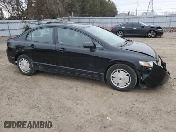 2010 Honda Civic with VIN 2HGFA1F25AH015520, listed as a Copart auction lot 50523565 with 169,256 mi miles and Salvage title. Bid and sale history available at DreamBid. Image 4.
