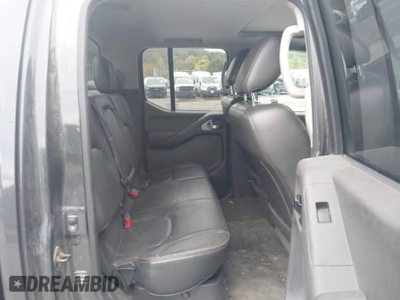 2011 Nissan Frontier Pro-4X with VIN 1N6AD0EVXBC449701, listed as a IAAI auction lot 43436699 with 223,651 mi miles and . Bid and sale history available at DreamBid. Image 8.