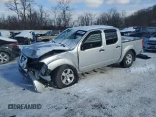 2010 Nissan Frontier Pro-4X with VIN 1N6AD0EV8AC414587, listed as a Copart auction lot 87806035 with 81,378 mi miles and Salvage title. Bid and sale history available at DreamBid. Image 1.