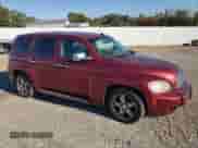 2009 Chevrolet HHR 1LT with VIN 3GNCA23B49S590428, listed as a Copart auction lot 76938344 with 142,357 mi miles and Salvage title. Bid and sale history available at DreamBid. Image 4.