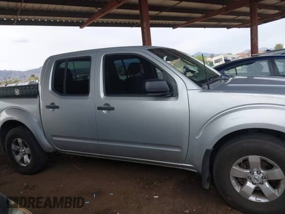 2009 Nissan Frontier SE with VIN 1N6AD07W39C414367, listed as a IAAI auction lot 41809433 with 193,351 mi miles and . Bid and sale history available at DreamBid. Image 13.