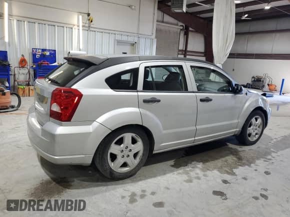 2008 Dodge Caliber SE with VIN 1B3HB28B78D779417, listed as a Copart auction lot 71234075 with 80,645 mi miles and Salvage title. Bid and sale history available at DreamBid. Image 3.