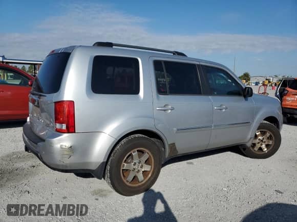 2010 Honda Pilot Touring с VIN 5FNYF4H87AB003161, выставлен на аукционе Copart как лот 89436975 с пробегом 160 834 миль миль и Чистый • Clean title. История ставок и продаж доступна на DreamBid. Изображение 3.