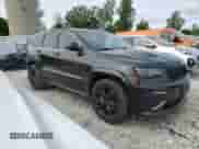 2014 Jeep Grand Cherokee SRT-8 z VIN 1C4RJFDJ3EC387806, wystawiony jako Copart lot #58580555 z przebiegiem 110 498 mil mil oraz Czysty tytuł • Clean title. Historia ofert i sprzedaży dostępna na DreamBid. Obrazek 4.