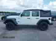 2024 Jeep Wrangler Sport S with VIN 1C4PJXDG9RW308614, listed as a IAAI auction lot 42026232 with 4,987 mi miles and . Bid and sale history available at DreamBid. Image 14.