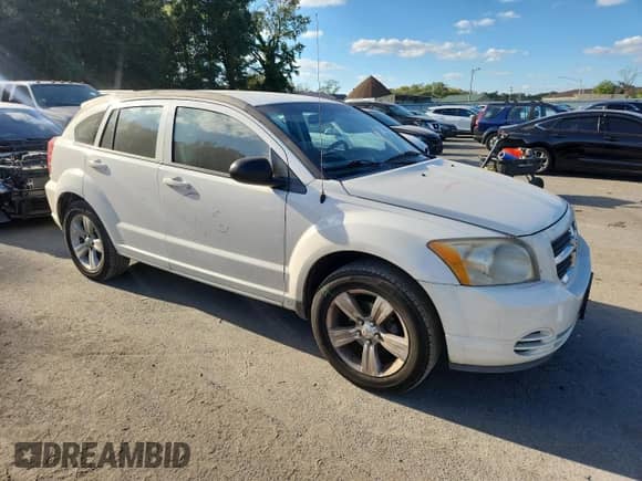 2010 Dodge Caliber SXT with VIN 1B3CB4HA9AD529504, listed as a Copart auction lot 84952075 with 194,083 mi miles and Salvage title. Bid and sale history available at DreamBid. Image 4.
