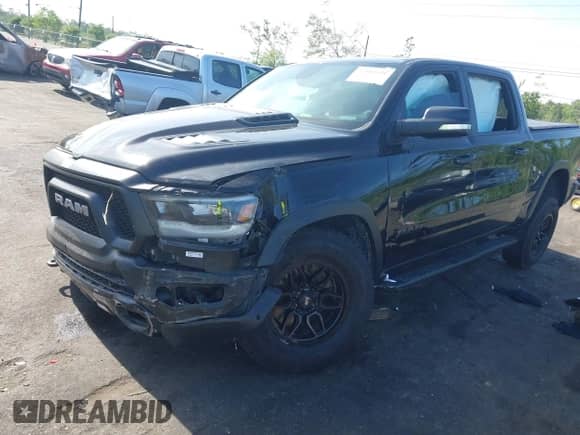 2019 Ram 1500 Rebel z VIN 1C6SRFLT3KN630552, wystawiony jako IAAI lot #42184521 z przebiegiem 126 934 mil mil oraz . Historia ofert i sprzedaży dostępna na DreamBid. Obrazek 17.