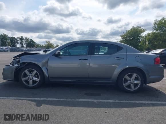2013 Dodge Avenger SE with VIN 1C3CDZAB0DN535896, listed as a IAAI auction lot 43187549 with 132,614 mi miles and . Bid and sale history available at DreamBid. Image 14.