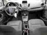 2014 Ford Fiesta S z VIN 3FADP4AJ1EM125465, wystawiony jako Copart lot #57954905 z przebiegiem 91 955 mil mil oraz Nie do naprawy • Non repairable. Historia ofert i sprzedaży dostępna na DreamBid. Obrazek 8.