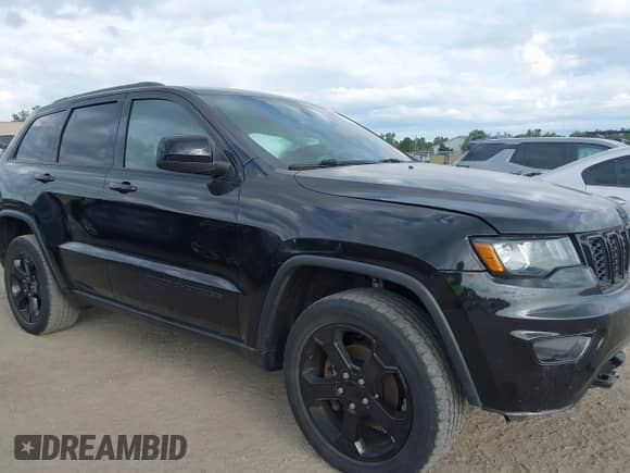 2020 Jeep Grand Cherokee Laredo E with VIN 1C4RJFAG3LC134667, listed as a IAAI auction lot 43103196 with 107,832 mi miles and . Bid and sale history available at DreamBid. Image 14.