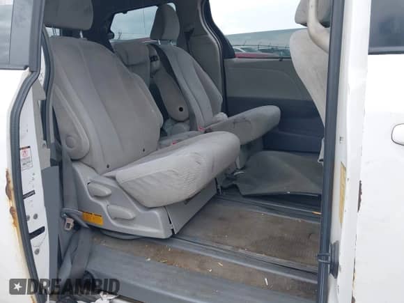 2012 Toyota Sienna LE AAS with VIN 5TDKK3DC0CS261672, listed as a IAAI auction lot 43256260 with 477,784 mi miles and . Bid and sale history available at DreamBid. Image 8.