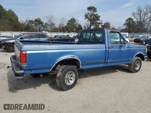 1990 Ford F-150 with VIN 1FTEF14N6LNB21235, listed as a Copart auction lot 46149815 with 76,777 mi miles and Salvage title. Bid and sale history available at DreamBid. Image 3.