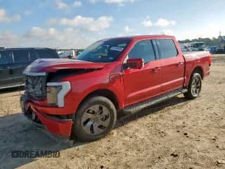 2022 Ford F-150 Lightning Lariat with VIN 1FT6W1EV8NWG01941, listed as a Copart auction lot 83766455 with 45,954 mi miles and Salvage title. Bid and sale history available at DreamBid. Image 1.