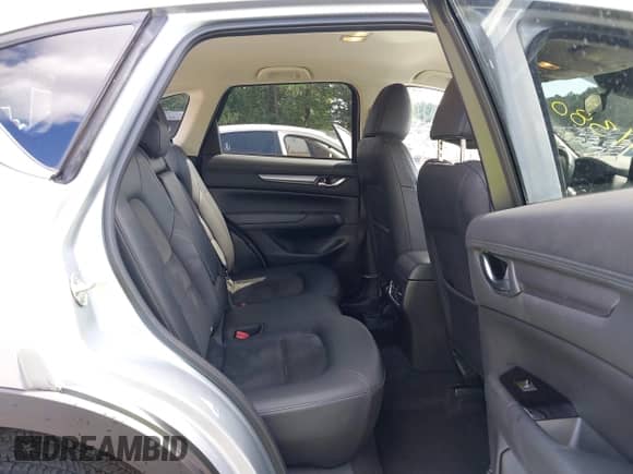 2023 Mazda CX-5 S Select with VIN JM3KFBBM6P0208887, listed as a IAAI auction lot 43113803 with 26,288 mi miles and . Bid and sale history available at DreamBid. Image 8.