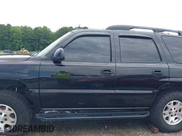 2004 Chevrolet Tahoe Z71 with VIN 1GNEK13Z04R237385, listed as a IAAI auction lot 42683390 with 280,112 mi miles and . Bid and sale history available at DreamBid. Image 14.
